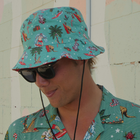 Dive into the festive spirit with this Aussie Christmas Green Bucket Hat! Whether you turn it one way or the other, you'll be spreading cheer and keeping the sun out of your eyes with its reversible design. So, get your hat on and get ready for a ho-ho-holiday season! Green one side and Red the other. Make a list....check it twice...then place your order with Island Style Clothing.  It also perfectly pairs with matching Xmas shirts and shorts.