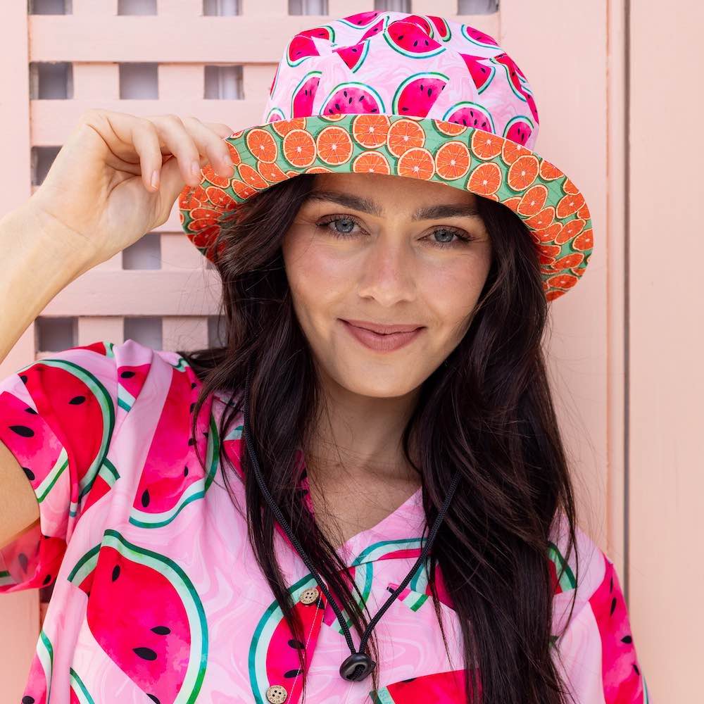 Bringing you the perfect way to top off your show-stopping Festival 'fit. Get two for the price of one with our reversible bucket hats. One side is our Shake Ya Melons and the other side is our Groovy Grapefruit. Pimm's o'clock is approaching; you pour, we've prepped the fruit.