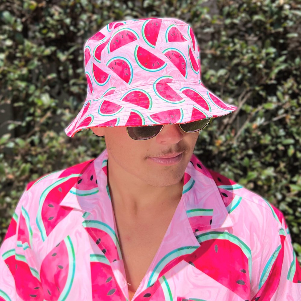 Bringing you the perfect way to top off your show-stopping Festival 'fit. Get two for the price of one with our reversible bucket hats. One side is our Shake Ya Melons and the other side is our Groovy Grapefruit. Pimm's o'clock is approaching; you pour, we've prepped the fruit.