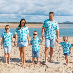 Make sure your little ones are the center of attention with the Island Blues Kids Unisex Hawaiian Shirt! Featuring fun palm tree prints on 100% cotton, this is perfect for all their summer and cruisin' adventures (don't forget to get the matching items for the whole family!).   Get ready to party under the palms! View the Island Blues Collection.