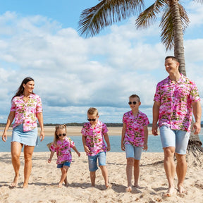 Put a smile on your kids' faces and let them “flamingle” with this Pink Flamingo Kids Unisex Hawaiian Shirt! Featuring eye-catching pink flamingos on a pink base, this soft rayon shirt is perfect for summer fun and cruisewear.  Get the matching items for the whole family and create a coordinated look! View the Pink Flamingo Collection. 
