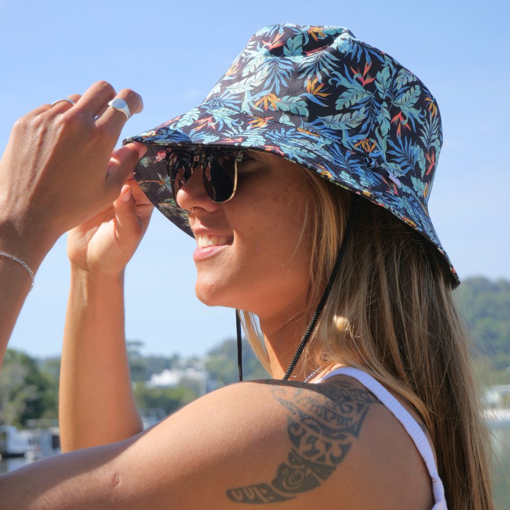 The perfect way to polish off your show-stopping Festival 'fit. Our reversible bucket hats offer two unique designs - one side featuring Jungle Fever and the other, Flamingo Nights - for a double dose of style at a single cost.