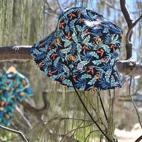 The perfect way to polish off your show-stopping Festival 'fit. Our reversible bucket hats offer two unique designs - one side featuring Jungle Fever and the other, Flamingo Nights - for a double dose of style at a single cost.