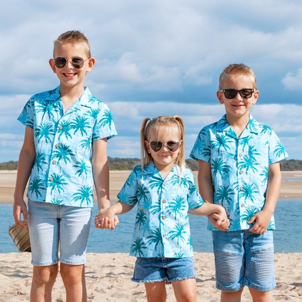 Make sure your little ones are the center of attention with the Island Blues Kids Unisex Hawaiian Shirt! Featuring fun palm tree prints on 100% cotton, this is perfect for all their summer and cruisin' adventures (don't forget to get the matching items for the whole family!).   Get ready to party under the palms! View the Island Blues Collection.