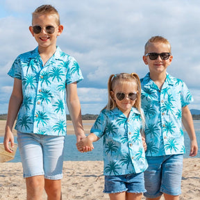 Make sure your little ones are the center of attention with the Island Blues Kids Unisex Hawaiian Shirt! Featuring fun palm tree prints on 100% cotton, this is perfect for all their summer and cruisin' adventures (don't forget to get the matching items for the whole family!).   Get ready to party under the palms! View the Island Blues Collection.