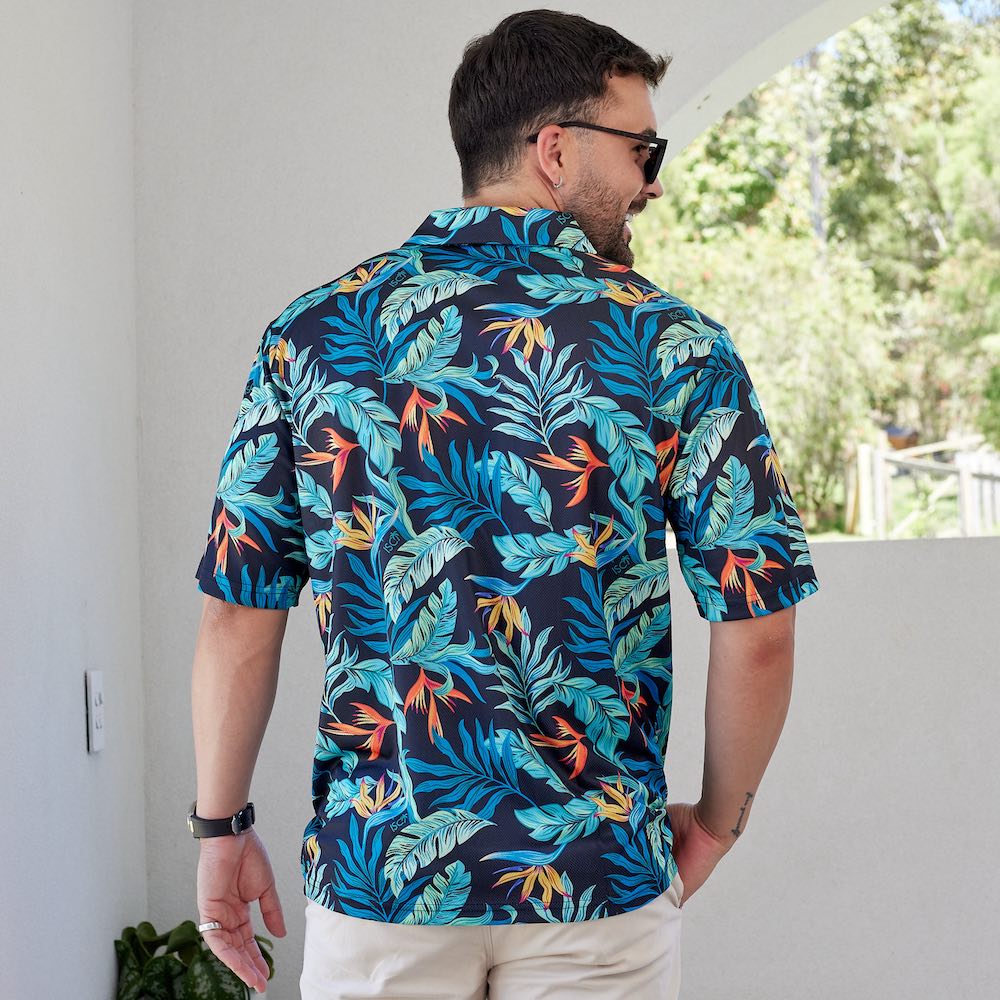Jungle Fever is ready to make your next golf outing a wild ride! This fun polo shirt is the perfect companion for a day on the greens, with its breathable, moisture-wicking fabric to keep you cool and comfortable no matter how wild your putting gets!  The shirt is designed to give you optimal freedom of movement for a peak performance. Plus, it's stylish enough to make a fashion statement without sinking your score. Swing into action!