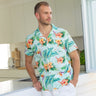 Lounge in paradise with this Green Paradise - Mens Hawaiian Shirt! This classic aloha print is made from 100% cotton - perfect for uniforms, cruises, and other tropical getaways. Make a statement and show off your sandy side in style!