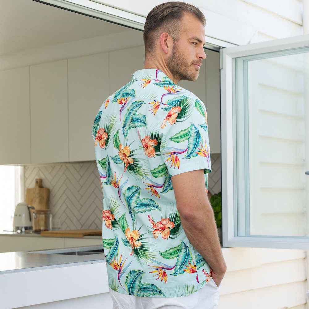 Lounge in paradise with this Green Paradise - Mens Hawaiian Shirt! This classic aloha print is made from 100% cotton - perfect for uniforms, cruises, and other tropical getaways. Make a statement and show off your sandy side in style!