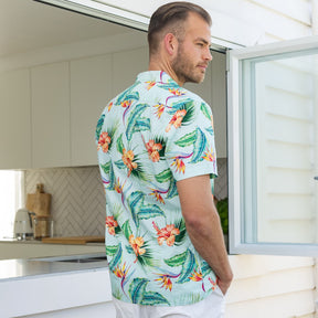 Lounge in paradise with this Green Paradise - Mens Hawaiian Shirt! This classic aloha print is made from 100% cotton - perfect for uniforms, cruises, and other tropical getaways. Make a statement and show off your sandy side in style!