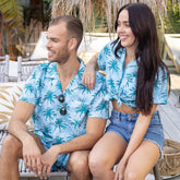 Let your style sail off into the wild blue yonder with our Island Blues Hawaiian Shirt! This modern take on island style is crafted from 100% cotton for a fresh and breezy look, while its striking blue design featuring palm trees brings a sunny, tropical feel to any look. Perfect for uniforms, cruises, or just chillin' out with friends!