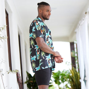 The perfect party shirt! It's cool and comfortable with a stand out flamingo and palm trees print on a black base. Double up with the matching shorts.  Take your look to the next level by adding matching Shorts, Kaftans, and Crop Shirts. View the Flamingo Nights Collection. 