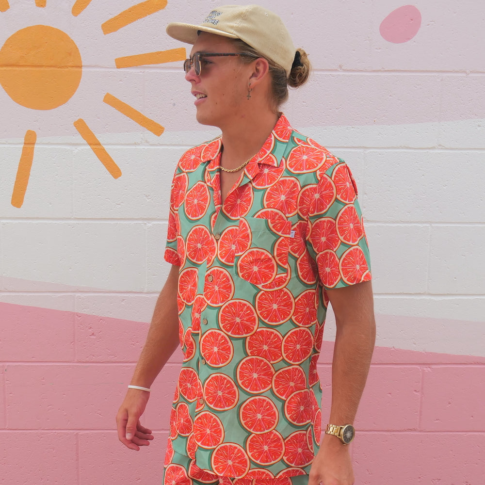 Unapologetically fruity. Get a taste of this Groovy Grapefruit Shirt! It's giving summer vibes. Whether it’s days at the beach, nights out with friends, festivals, or backyard barbecues, you'll be turning heads.