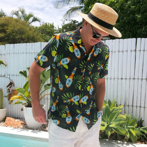 Ready to turn your next vacation into a "Happy Hour"? Show off your tropical style with this shirt and shorts set - featuring an in-house design with beer bottles, limes and leaves on a black base. So cheers to you, and to always having the coolest look!  This Shirt is breathable and lightweight cotton rayon blend and the shorts are quick-drying and durable made from recycled plastic bottles! 