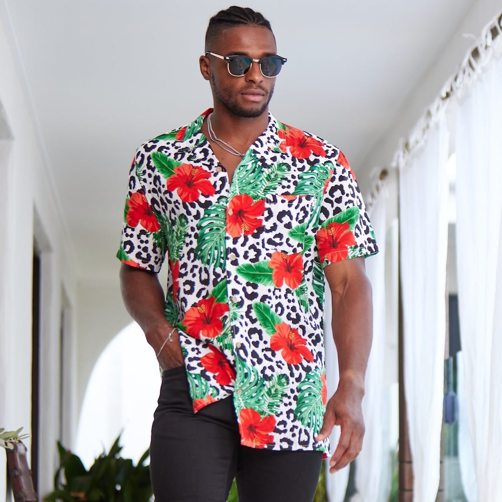 Looking for a stylish and eye-catching shirt for your next festival? Check out the Party Animal Mens Shirt in leopard print with vibrant hibiscus flowers and monstera leaves! This shirt is sure to make you stand out in the crowd with its bold and fun design. The lightweight and breathable material ensures you stay comfortable in warm weather, while the relaxed fit allows for easy movement while dancing or socialising.