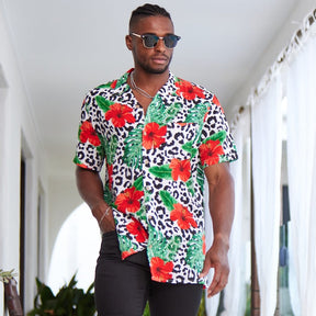 Looking for a stylish and eye-catching shirt for your next festival? Check out the Party Animal Mens Shirt in leopard print with vibrant hibiscus flowers and monstera leaves! This shirt is sure to make you stand out in the crowd with its bold and fun design. The lightweight and breathable material ensures you stay comfortable in warm weather, while the relaxed fit allows for easy movement while dancing or socialising.