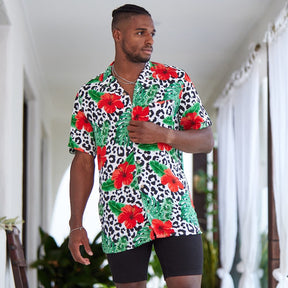 Looking for a stylish and eye-catching shirt for your next festival? Check out the Party Animal Mens Shirt in leopard print with vibrant hibiscus flowers and monstera leaves! This shirt is sure to make you stand out in the crowd with its bold and fun design. The lightweight and breathable material ensures you stay comfortable in warm weather, while the relaxed fit allows for easy movement while dancing or socialising.