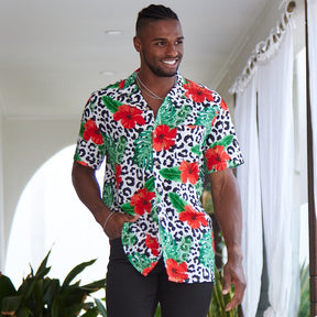 Looking for a stylish and eye-catching shirt for your next festival? Check out the Party Animal Mens Shirt in leopard print with vibrant hibiscus flowers and monstera leaves! This shirt is sure to make you stand out in the crowd with its bold and fun design. The lightweight and breathable material ensures you stay comfortable in warm weather, while the relaxed fit allows for easy movement while dancing or socialising.