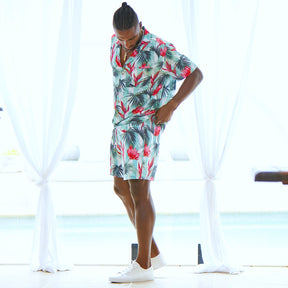 Looking for a stylish and comfortable outfit for your next summer adventure? Check out the Summer Daze Mens Shirt & Shorts set, featuring a modern Aussie twist with white and green stripes and beautiful Waratah flowers. This outfit is perfect for any outdoor activity, from beach parties to backyard BBQs.  Level up the look and add a matching Unisex Shirt or Crop Shirt for your partner. View the Summer Daze Collection. 