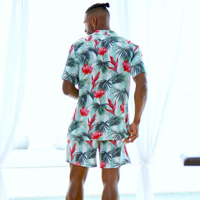 Looking for a stylish and comfortable outfit for your next summer adventure? Check out the Summer Daze Mens Shirt & Shorts set, featuring a modern Aussie twist with white and green stripes and beautiful Waratah flowers. This outfit is perfect for any outdoor activity, from beach parties to backyard BBQs.  Level up the look and add a matching Unisex Shirt or Crop Shirt for your partner. View the Summer Daze Collection. 