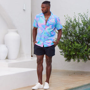 Lucid Dreams; a modern Psychedelic twist to a Hawaiian shirt. Beach season meets festival season! Intense bright colours because you don't have to be woke to make a statement with fashion.  Level up the look and add matching Swim Shorts or Bucket Hat. View the Lucid Dreams Collection. 