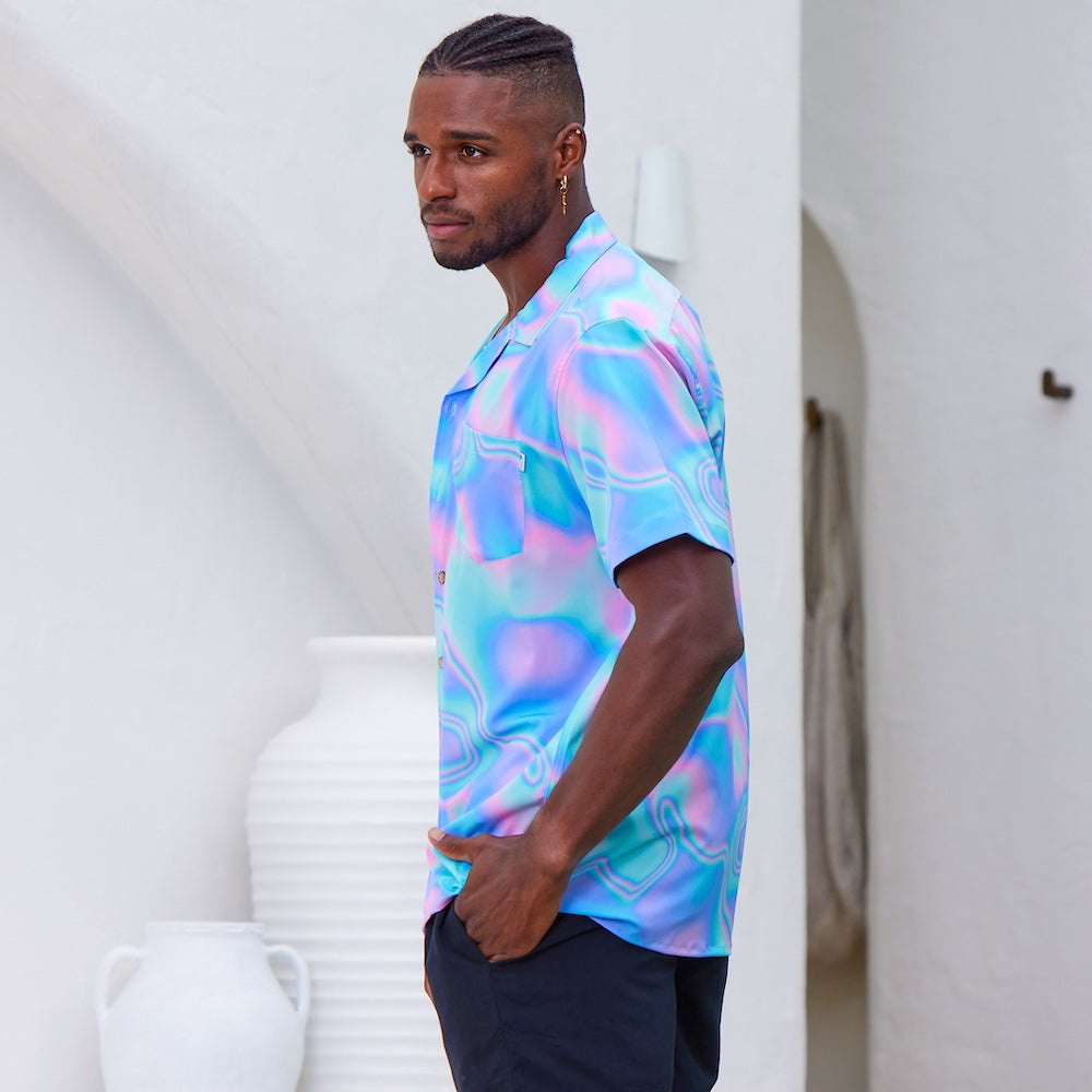 Lucid Dreams; a modern Psychedelic twist to a Hawaiian shirt. Beach season meets festival season! Intense bright colours because you don't have to be woke to make a statement with fashion.  Level up the look and add matching Swim Shorts or Bucket Hat. View the Lucid Dreams Collection. 