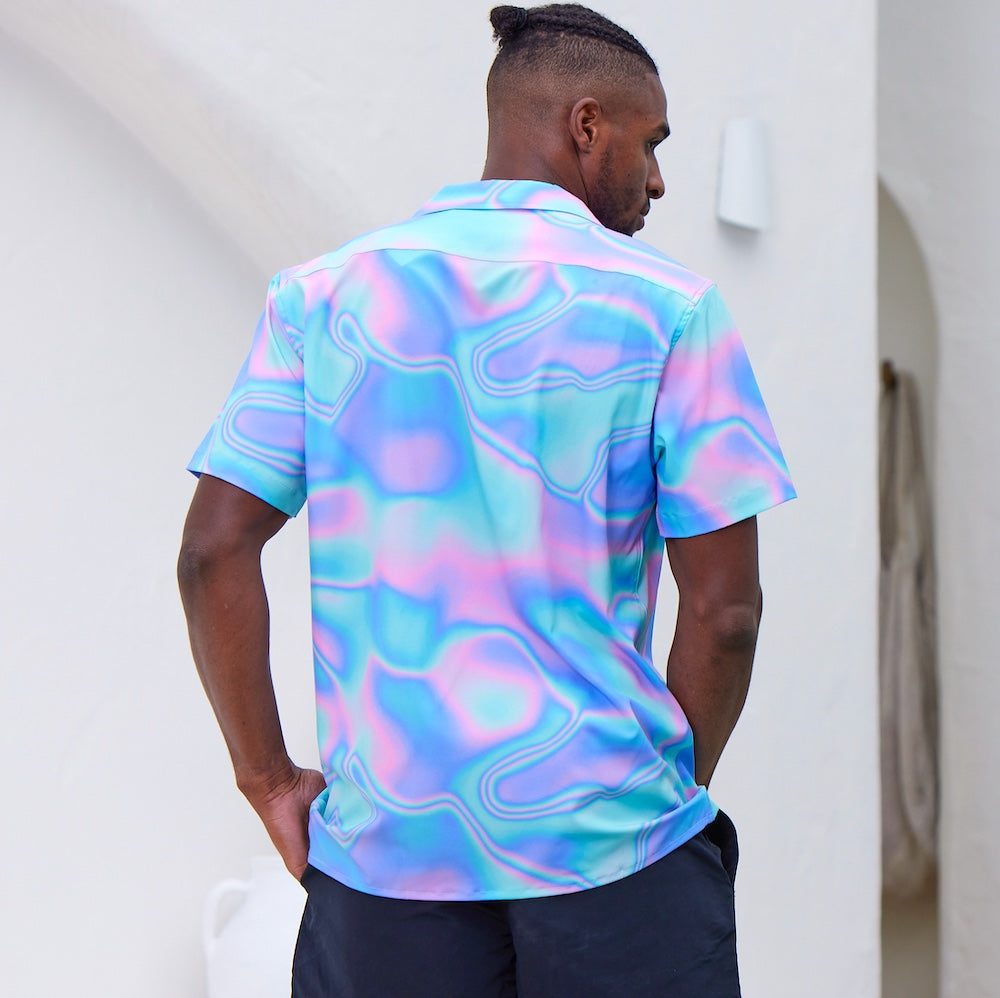 Lucid Dreams; a modern Psychedelic twist to a Hawaiian shirt. Beach season meets festival season! Intense bright colours because you don't have to be woke to make a statement with fashion.  Level up the look and add matching Swim Shorts or Bucket Hat. View the Lucid Dreams Collection. 