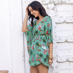 You know you look good when the Christmas Tree starts blowing kisses. Enjoy the perfect festive look with this Xmas Kaftan. Made with lightweight natural fabric, this cover-up is designed to keep you protected from the sun's rays while providing a beautiful tropical aesthetic. Ideal for Christmas days spent at the beach, tropical parties, or your upcoming Xmas cruise.