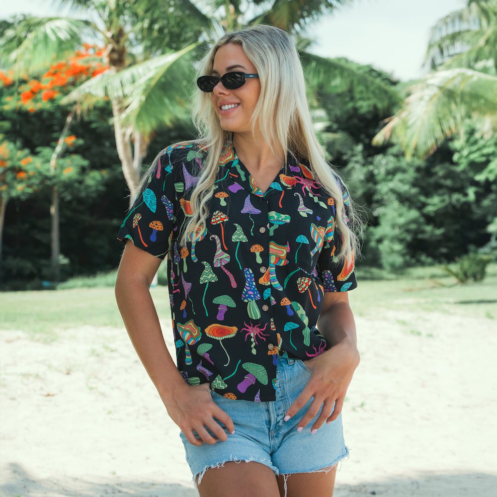 Grab a bit of magic with a Magic Mushroom Festival Shirt! Be the life of the party with a rainbow of 'shrooms on a black base, all made from a luxurious, soft rayon material. Perfect for any festive occasion! (And a great way to make sure your outfit stands out!)