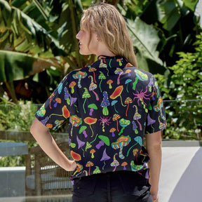 Grab a bit of magic with a Magic Mushroom Festival Shirt! Be the life of the party with a rainbow of 'shrooms on a black base, all made from a luxurious, soft rayon material. Perfect for any festive occasion! (And a great way to make sure your outfit stands out!)