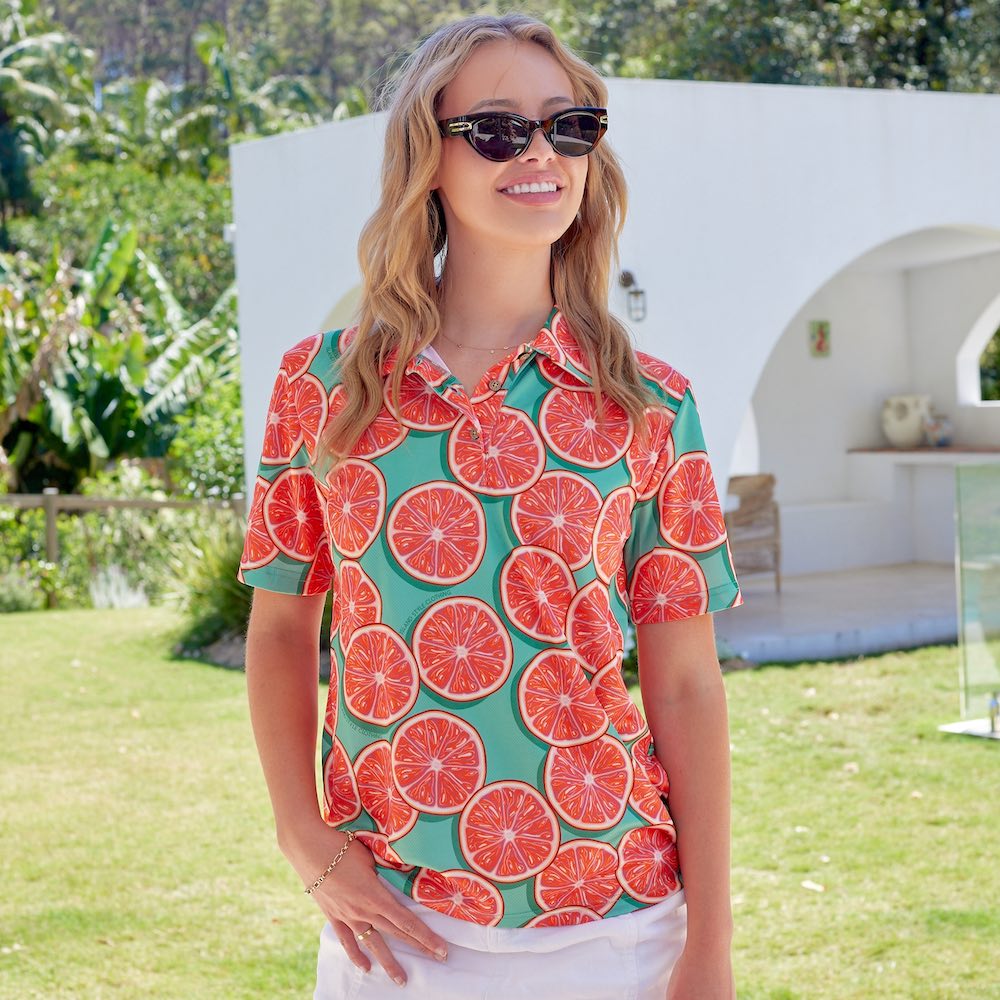 Swing into style with the Groovy Grapefruit Golf Polo Shirt! This lightweight, breathable polo features moisture-wicking technology and UPF 50+ for maximum protection. With a trendy collar and vibrant design, this polo is perfect for hitting the links in groovy, grapefruit-y goodness!