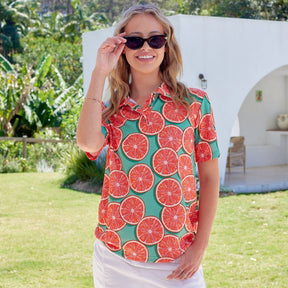 Swing into style with the Groovy Grapefruit Golf Polo Shirt! This lightweight, breathable polo features moisture-wicking technology and UPF 50+ for maximum protection. With a trendy collar and vibrant design, this polo is perfect for hitting the links in groovy, grapefruit-y goodness!