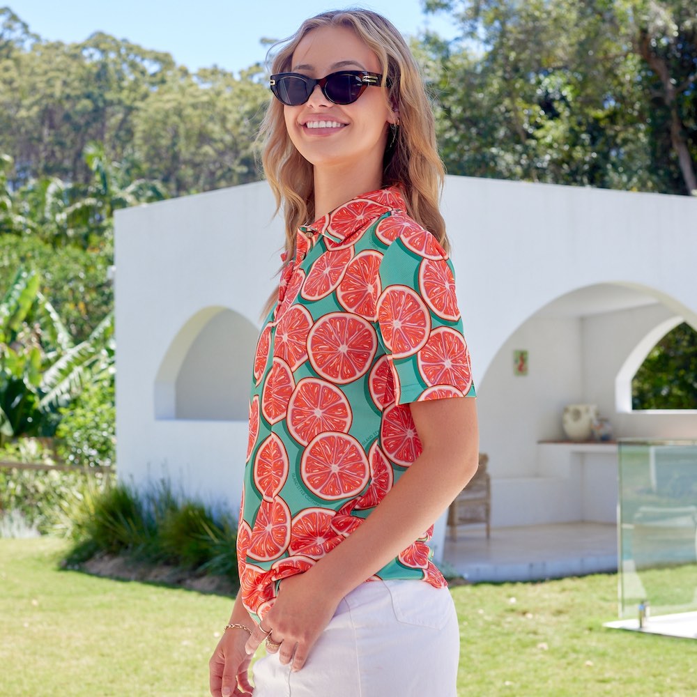 Swing into style with the Groovy Grapefruit Golf Polo Shirt! This lightweight, breathable polo features moisture-wicking technology and UPF 50+ for maximum protection. With a trendy collar and vibrant design, this polo is perfect for hitting the links in groovy, grapefruit-y goodness!