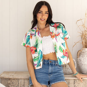 Kick up your wardrobe game with White Paradise! This Women's Crop Hawaiian Shirt is perfect for those who crave for the classic yet modern aloha print. 100% cotton for lasting comfort and style - it'll feel like paradise right on your shoulders!.