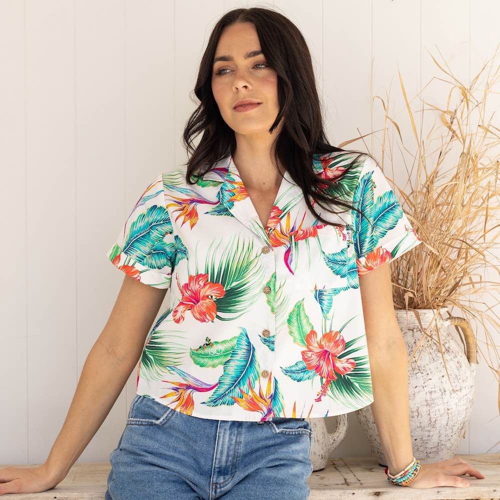 Kick up your wardrobe game with White Paradise! This Women's Crop Hawaiian Shirt is perfect for those who crave for the classic yet modern aloha print. 100% cotton for lasting comfort and style - it'll feel like paradise right on your shoulders!
