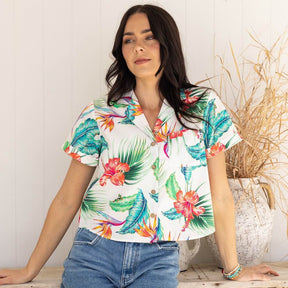 Kick up your wardrobe game with White Paradise! This Women's Crop Hawaiian Shirt is perfect for those who crave for the classic yet modern aloha print. 100% cotton for lasting comfort and style - it'll feel like paradise right on your shoulders!