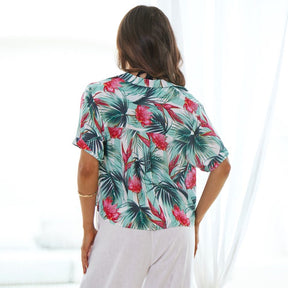 Show off your wild side with this Summer Daze Womens Crop Hawaiian Shirt! With its 100% rayon material and unique white and green stripes featuring tropical leaves and Australian warratah flowers, you'll be sure to make a statement and turn heads. Perfect for work uniforms or a night out cruising the town - you're sure to stay cool in this summer staple!  Complete the look by pairing with a matching Men's Shirt. Shop the Summer Daze Collection. 