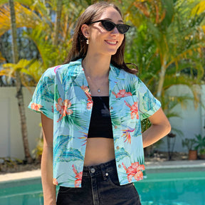 Step into summer in this Paradise Hawaiian Crop Shirt, this shirt steers itself away from the ordinary. Pair the Crop Shirt with Hawaiian Shorts to create a cute summer fit! We even have the matching Men's Hawaiian Shirt for your partner.