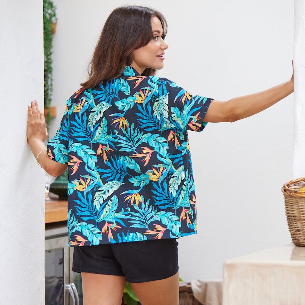 Experience next-level Aloha elegance with one of our Ladies Cut Hawaiian shirts! Pretty and perfunctory, these fabulously fresh looks take you from day to night, beach to boutique.   This breathable and lightweight cotton material makes them perfect for wearing in the hot summer months and for Staff Uniforms! Spice up the look with matching Swim Shorts or a matching Shirt for him.  View the Jungle Fever Collection.