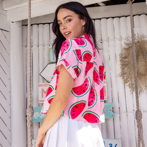 Liven up your 'round-the-clock wardrobe with Shake Ya Melons' Crop Shirt! An ode to festival vibes and fresh summer produce, this fun and fruity crop top features pink watermelons on a pink marble base. Get ready to turn some heads in the juiciest way possible!