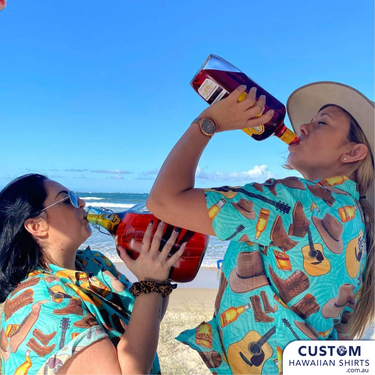 a couple of women standing next to each other on a beach