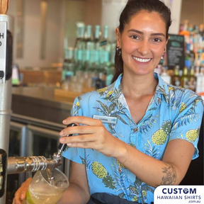 Bar and Hotel staff shirts custom-designed for Burleigh Heads Hotel. These hospitality uniforms feature pineapples and palms