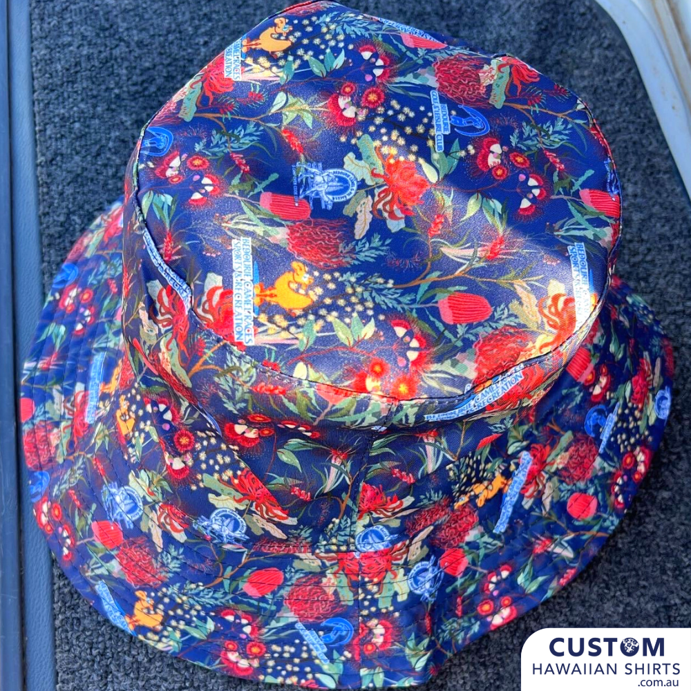 Bedourie Golf & Leisure Club got geared up for their annual 'Camel and Pig Races' out west QLD.  We designed and made for them reversible Custom Bucket Hats to match Hawaiian Shirts. Ridgey Didge best event festival merch. Designed with Australian botanicals.