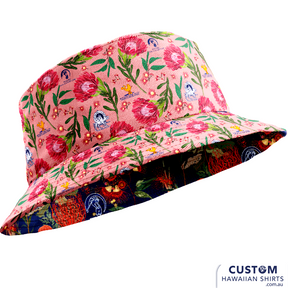 Bedourie Golf & Leisure Club geared up with some wicked personalised merch for their annual 'Camel and Pig Races' out west QLD.  We designed and made for them reversible Custom Bucket Hats to match Hawaiian Shirts. Ridgey Didge best event festival merch. Designed with Australian botanicals.