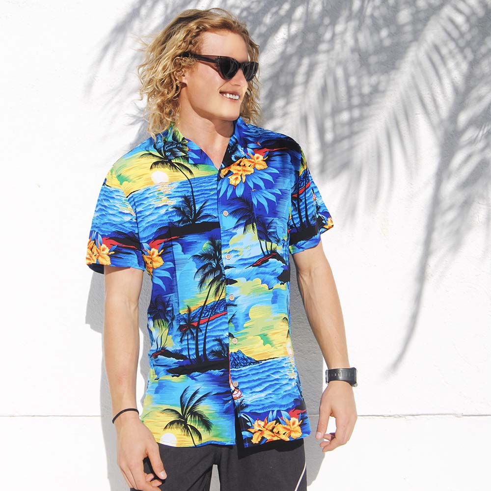 Upgrade your wardrobe with this Blue Sunset Hawaiian Aloha shirt. Crafted from durable rayon and featuring classic coconut buttons, this shirt offers a regular cut fit for all-day comfort. With its timeless blue sunset design, you'll look stylish while staying cool in any summer weather.