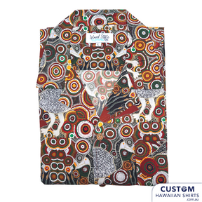 Customised Shirts made for Kuku Bulkaway Indigenous Art Gallery, Cooktown, FNQ. They paint stories they were taught as children about the local bush, food and animals.  They supplied photos of their hand-painted art (original paintings you can view in our photo gallery). From there our clever design team created a seamless pattern and we turned them into wearable art on shirts and shorts. Deadly style!