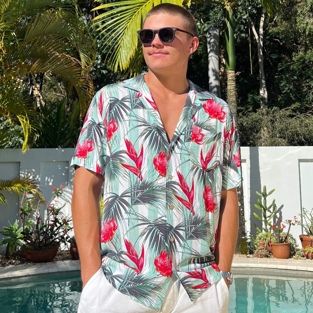 Whether you’re hitting the beach, barbecue or just out and about, this Aussie Hawaiian shirt will keep you looking cool and stylish this summer. This stylish shirt is crafted from 100% soft rayon and features white and green stripes paired with Australian Waratah flowers for a truly unique look.