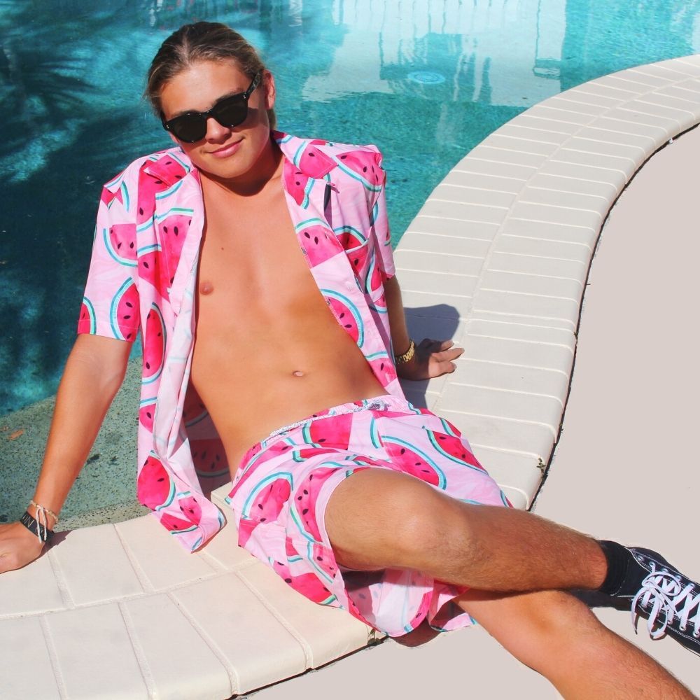 This men's shirt and shorts set from Shake Ya Melons features a lightweight and breathable fabric that makes it perfect for spring and summer days. It's moisture-wicking fabric ensures ultimate comfort and ease of movement. Enjoy a moisture-free experience with this stylish and sporty outfit.