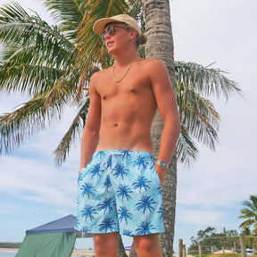 Our Island Blues - Stretch Swim Shorts are made for livin' it up in the sun! This 4 way stretch material is perfect for beach days, poolside lounging, and cruisin' the waves. Plus, the blue palm tree print kicks your summer wardrobe into high gear.