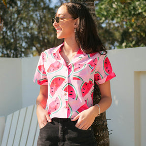 Liven up your 'round-the-clock wardrobe with Shake Ya Melons' Crop Shirt! An ode to festival vibes and fresh summer produce, this fun and fruity crop top features pink watermelons on a pink marble base. Get ready to turn some heads in the juiciest way possible!